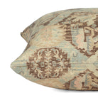 Side view of Tonic Living Zuri Driftwood decorative cushion highlighting its distressed, antique kilim-inspired pattern.