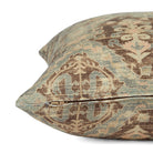 Side zipper detail of Tonic Living Zuri 22x22 toss cushion in a faded, vintage-inspired medallion pattern.