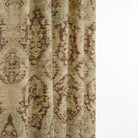 Tonic Living Zuri Driftwood curtain fabric shown draped, highlighting its soft movement and timeworn medallion pattern.