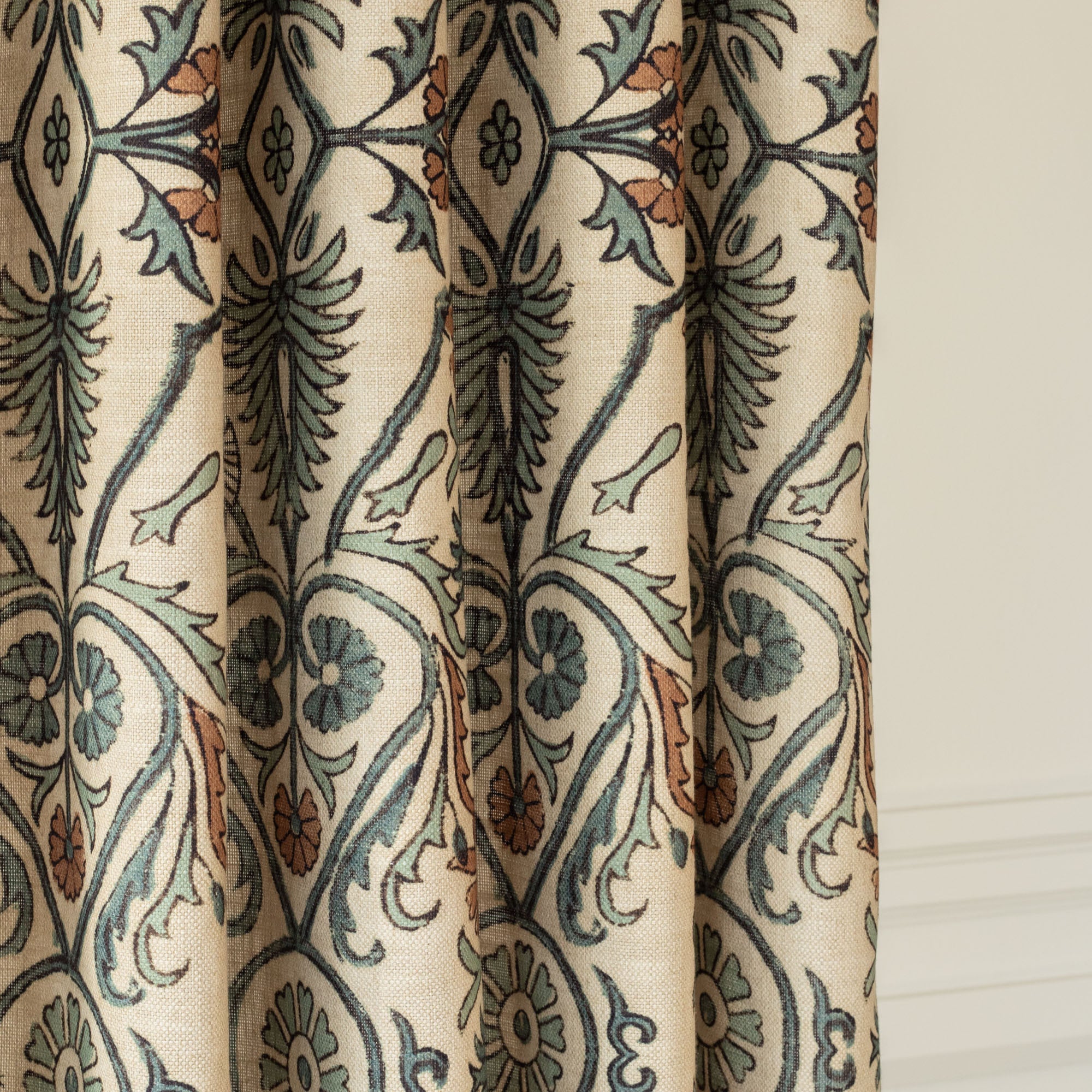 a brown, aqua, blue, beige floral vine block print pattern tonic living fabric