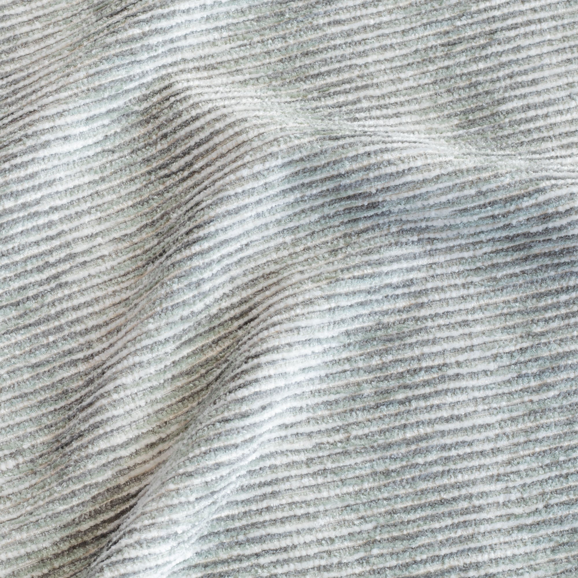 a watery blue grey and cream, chenille upholstery Tonic Living fabric