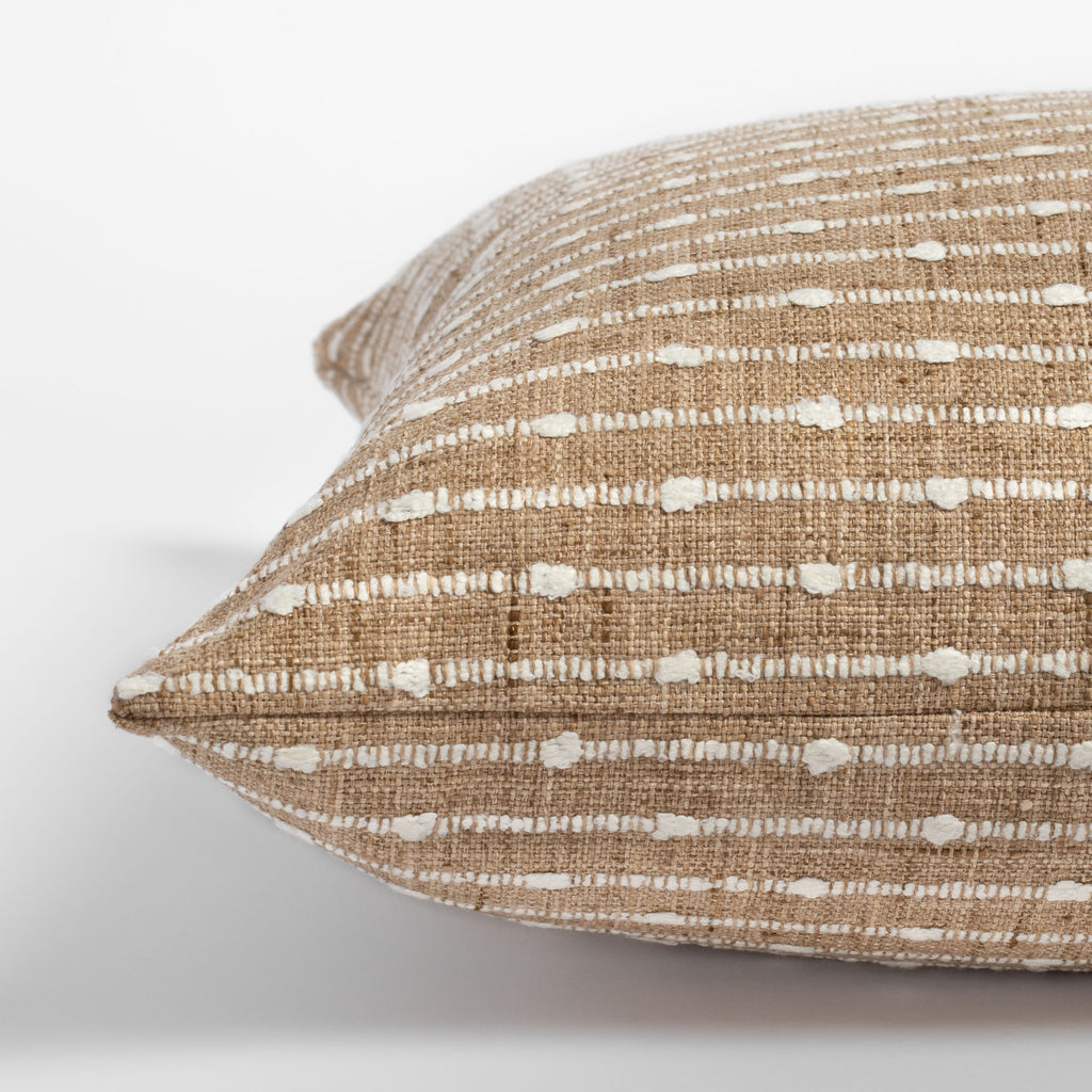 Arren Burlap, a camel pillow with cream horizontal stripes : side view