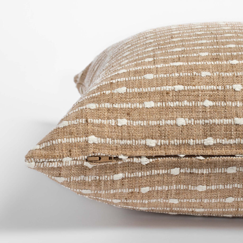 Arren Burlap, a camel pillow with cream horizontal stripes : zipper view