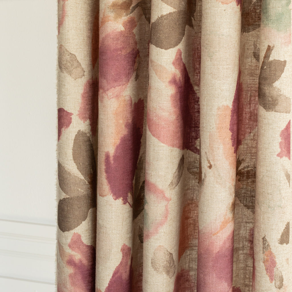 a painterly raspberry pink, coral and brown floral print drapery fabric 