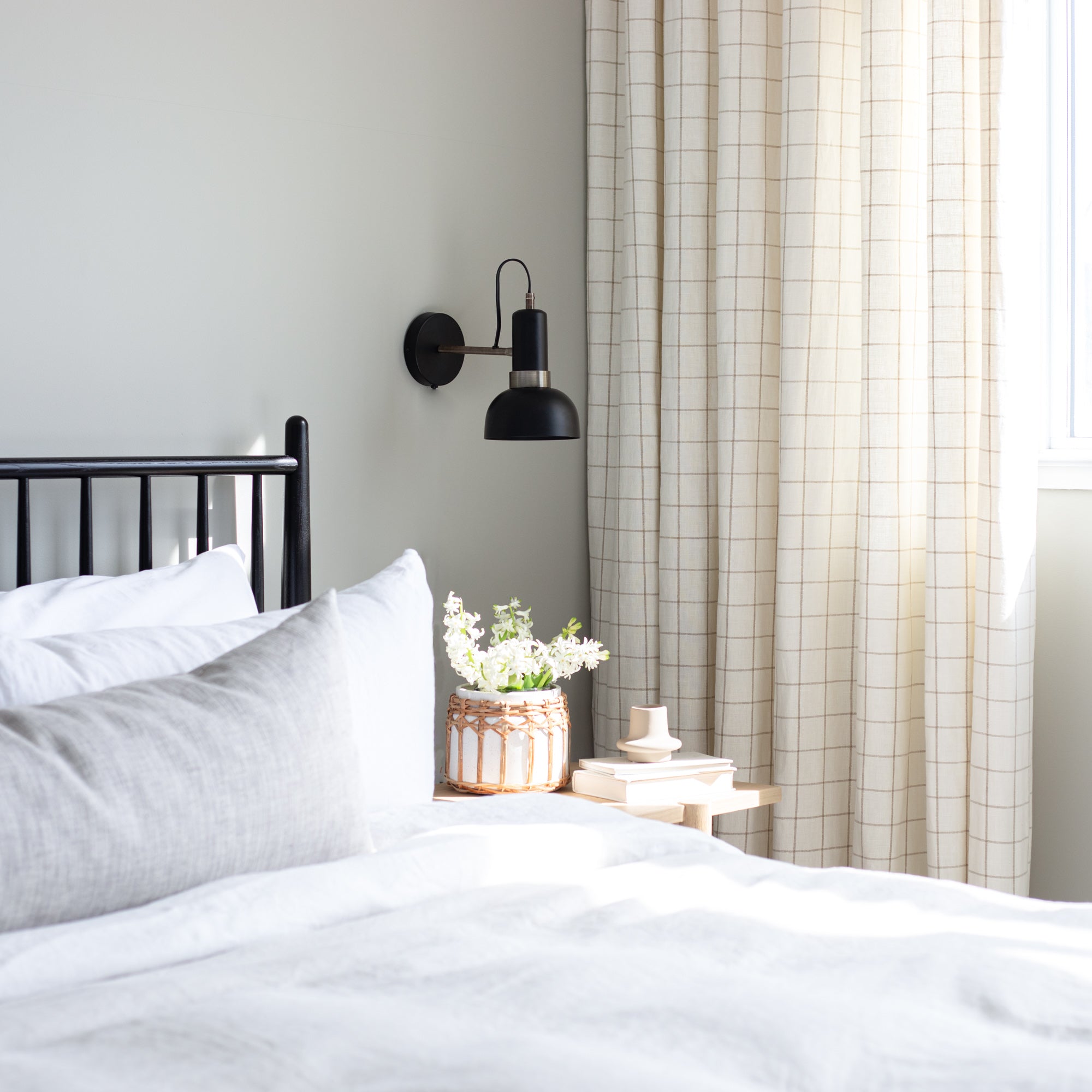 Neutral bedroom - cream and taupe windowpane drapery