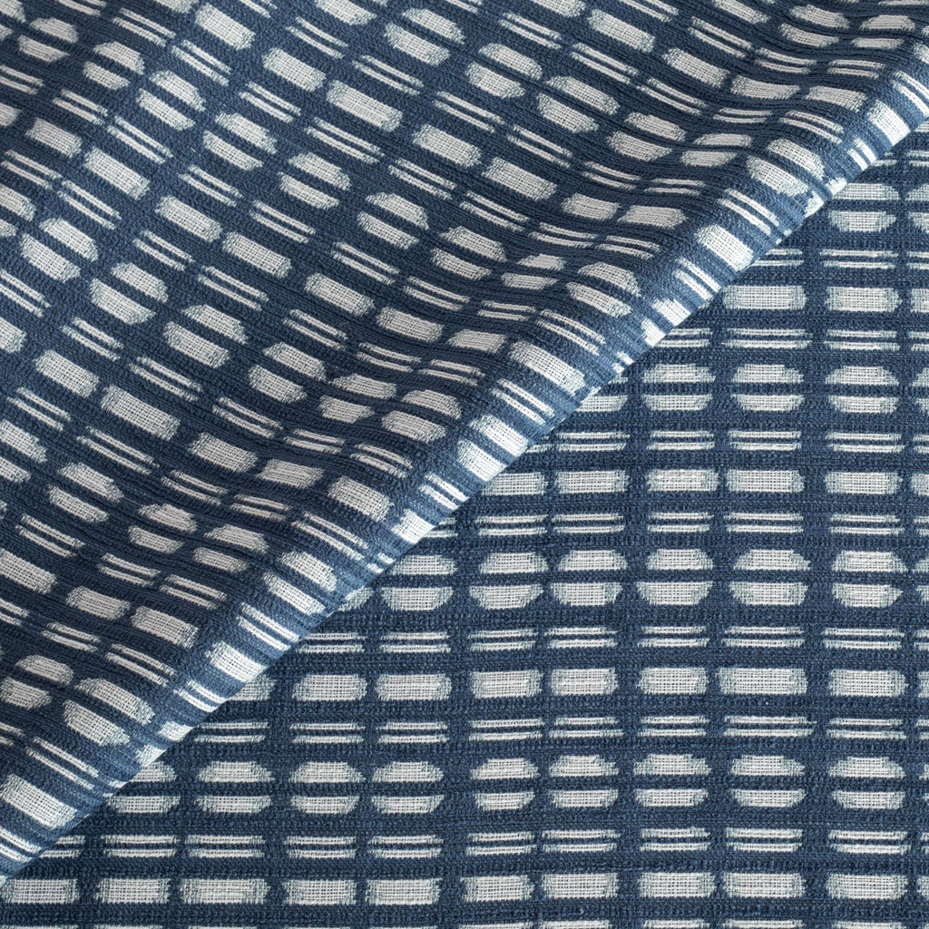 Calima Indigo blue and white ikat pattern indoor outdoor fabric from Tonic Living