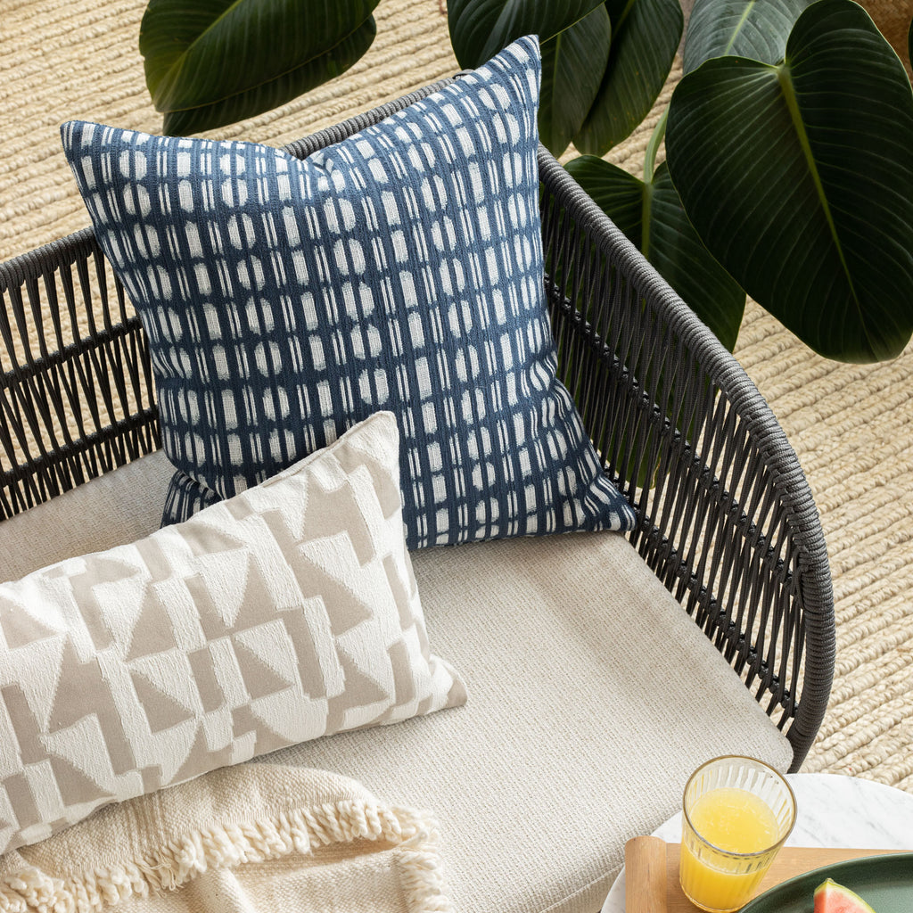 Outdoor vignette : modern graphic neutral coloured outdoor pillow from Tonic Living