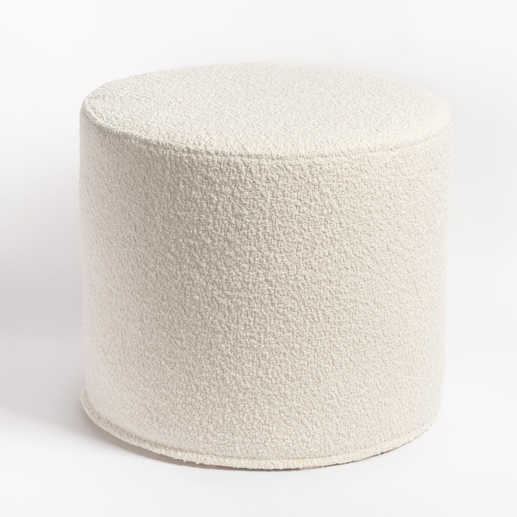 Cambie Boucle Chalk Ottoman, a creamy, off-white boucle fabric round ottoman from Tonic Living