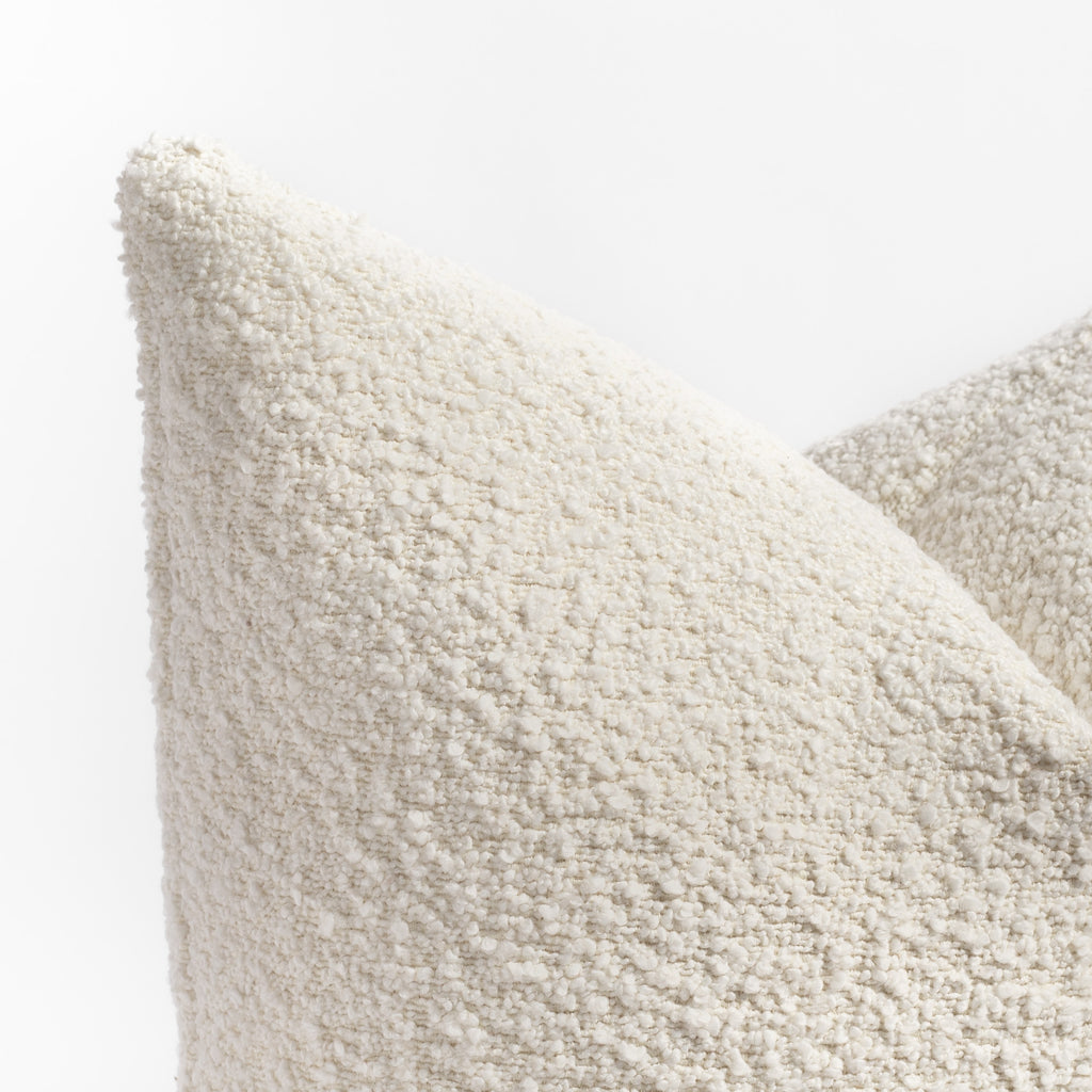 Cambie Boucle Chalk pillow, a cream boucle pillow with a beautiful chunky weave : close up of corner
