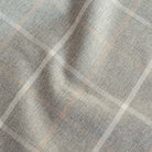 a heathered gray and cream plaid check upholstery fabric