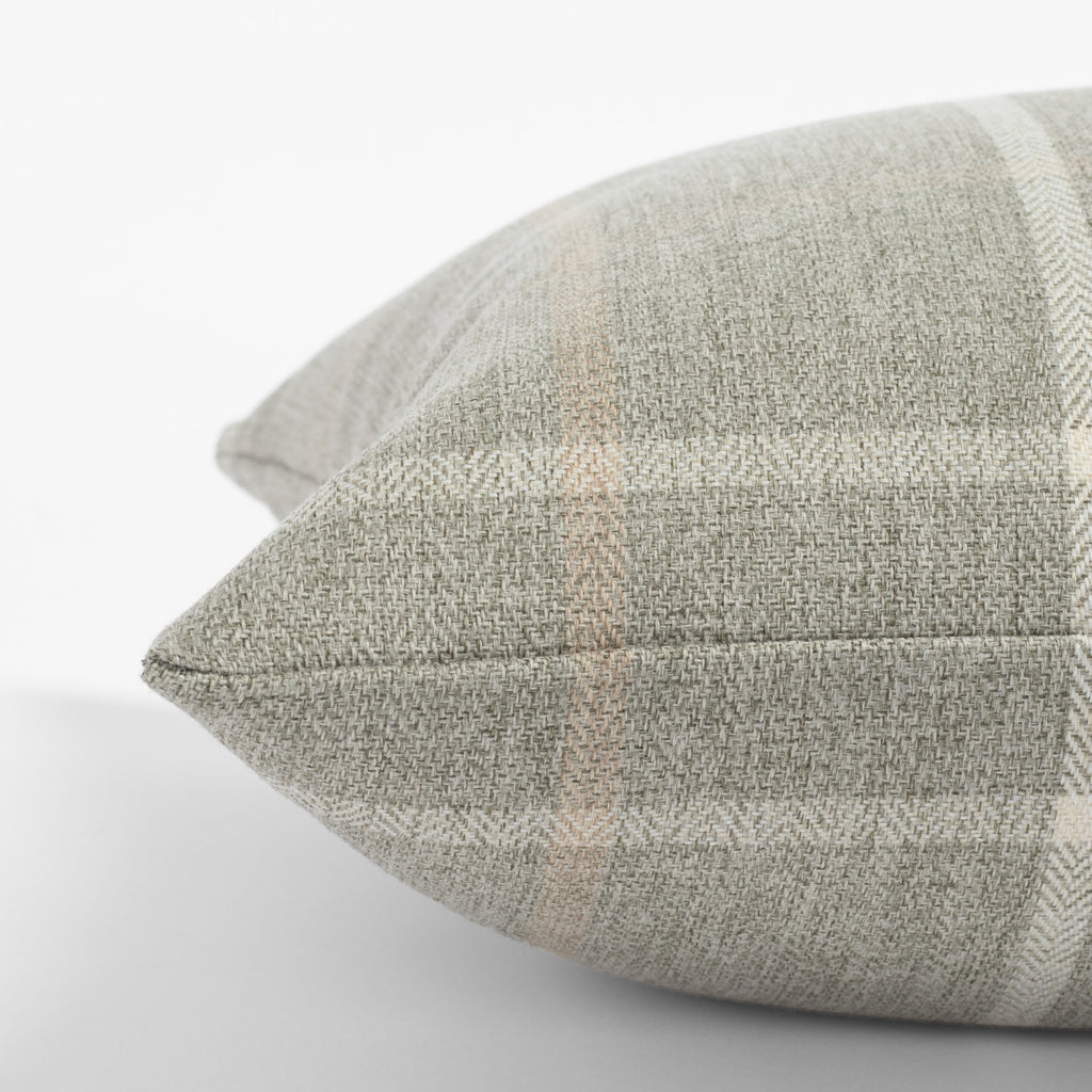 a gray, cream and camel plaid lumbar pillow : side view