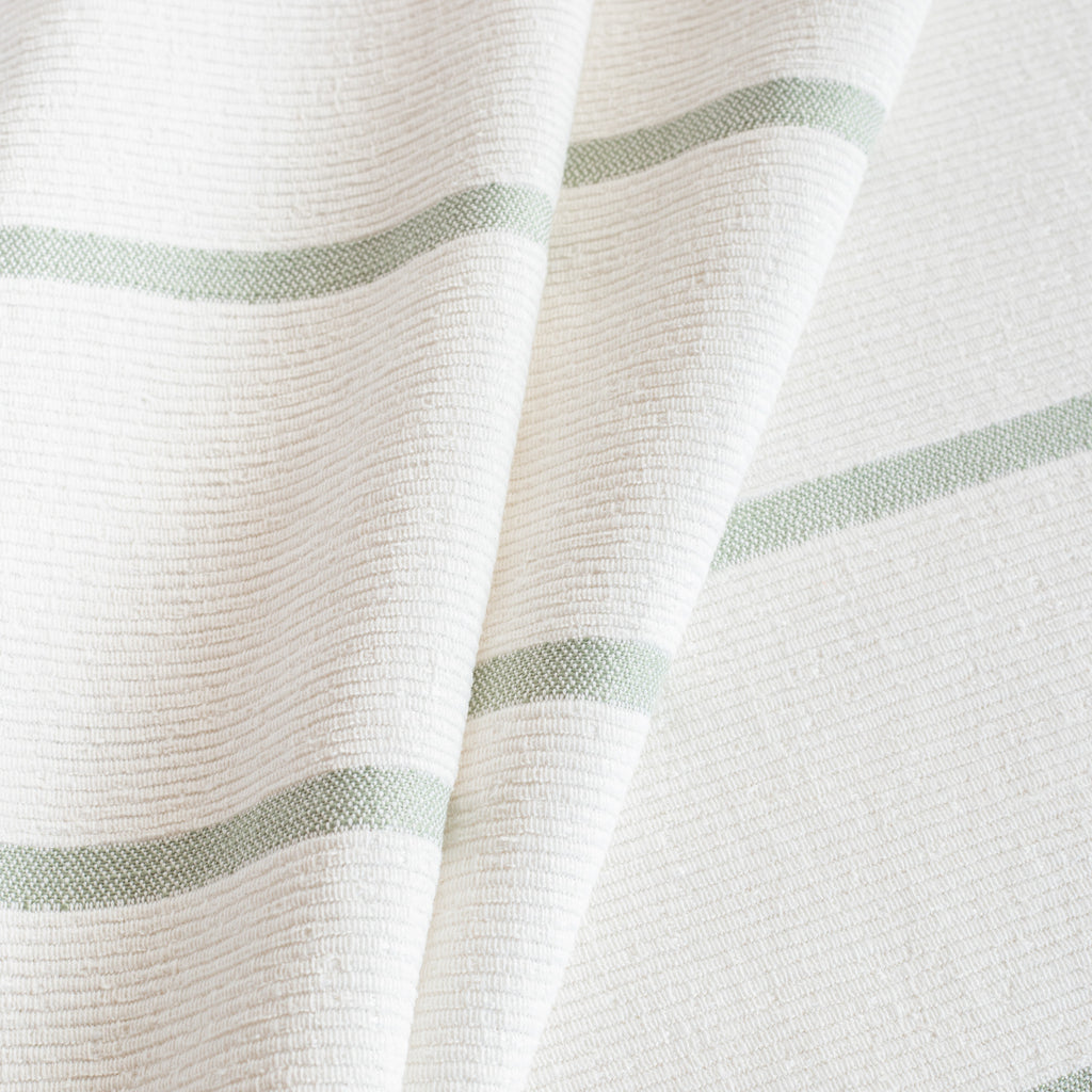a textured white and celadon green stripe home decor fabric