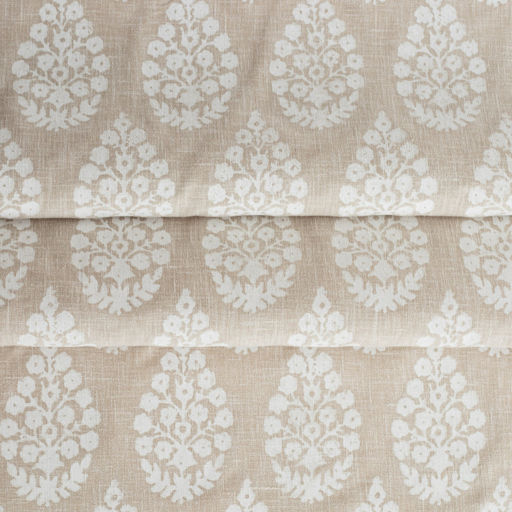 Chandra Beige Bisque, a white and beige floral block print Tonic Living fabric