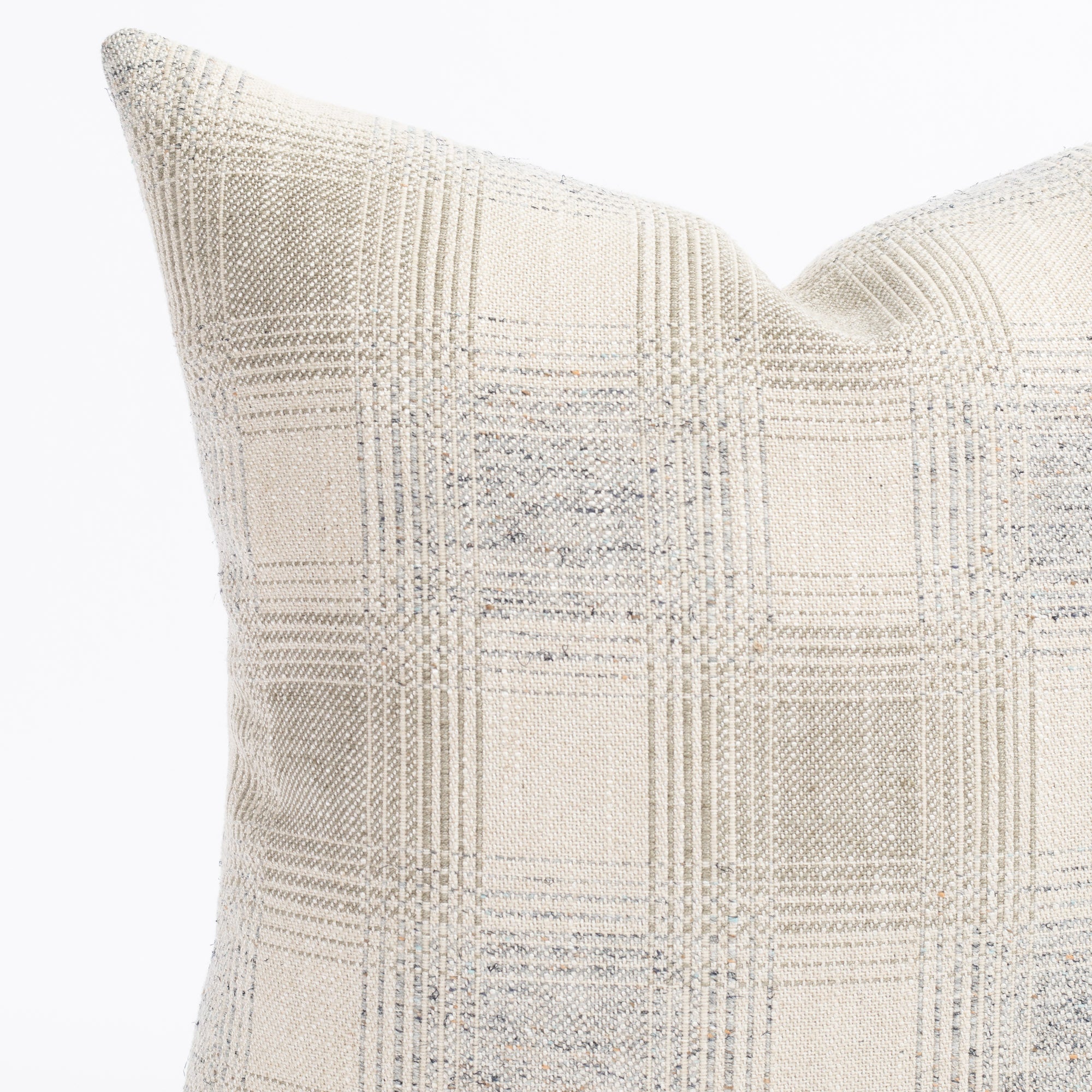 a light gray and denim blue plaid throw pillow : close up view