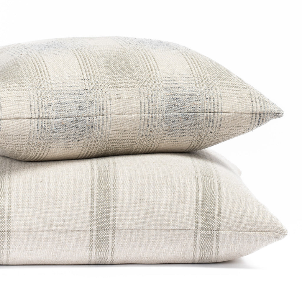 Tonic Living modern farmhouse throw pillows in muted cool light gray and blue tones