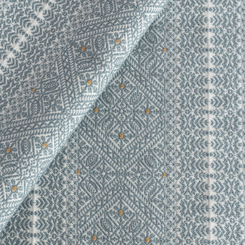 Delilah Stone Blue Fabric, a soft blue and white intricate pattern home decor fabric from Tonic Living