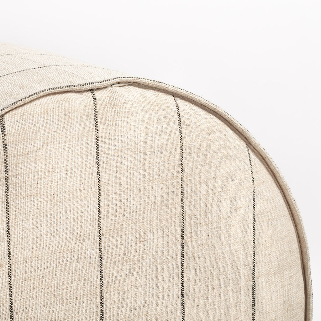 Dunrobin Round Ottoman Burlap, a beige with black stripe fabric round ottoman : close up bottom zipper