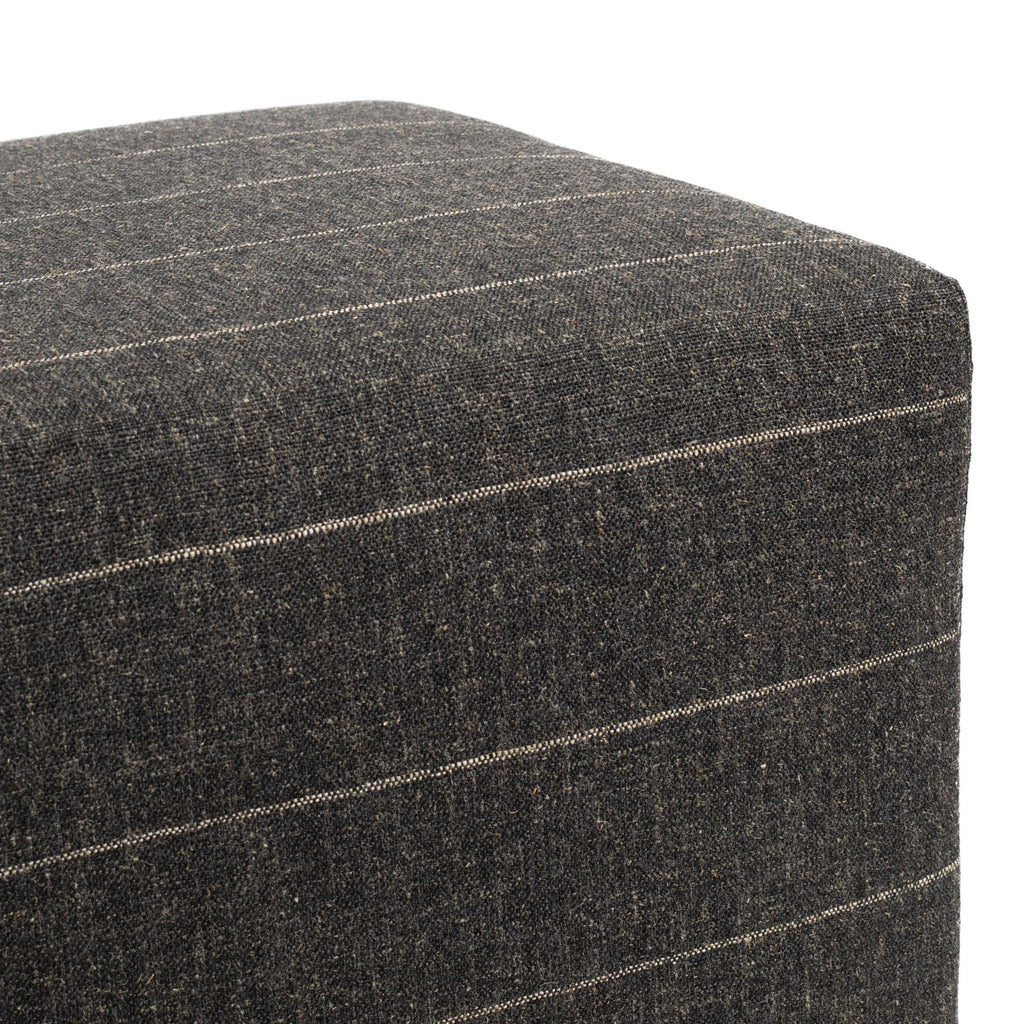 a charcoal gray and tan stripe cube ottoman : top detail shot