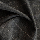 a wool like charcoal gray and brown stripe Tonic Living fabric