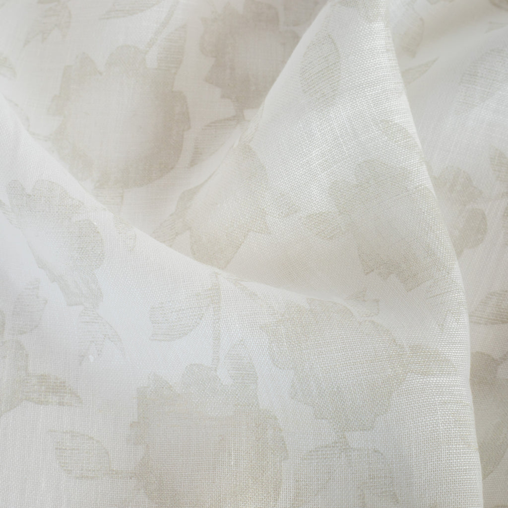 a white and flax beige floral print sheer fabric