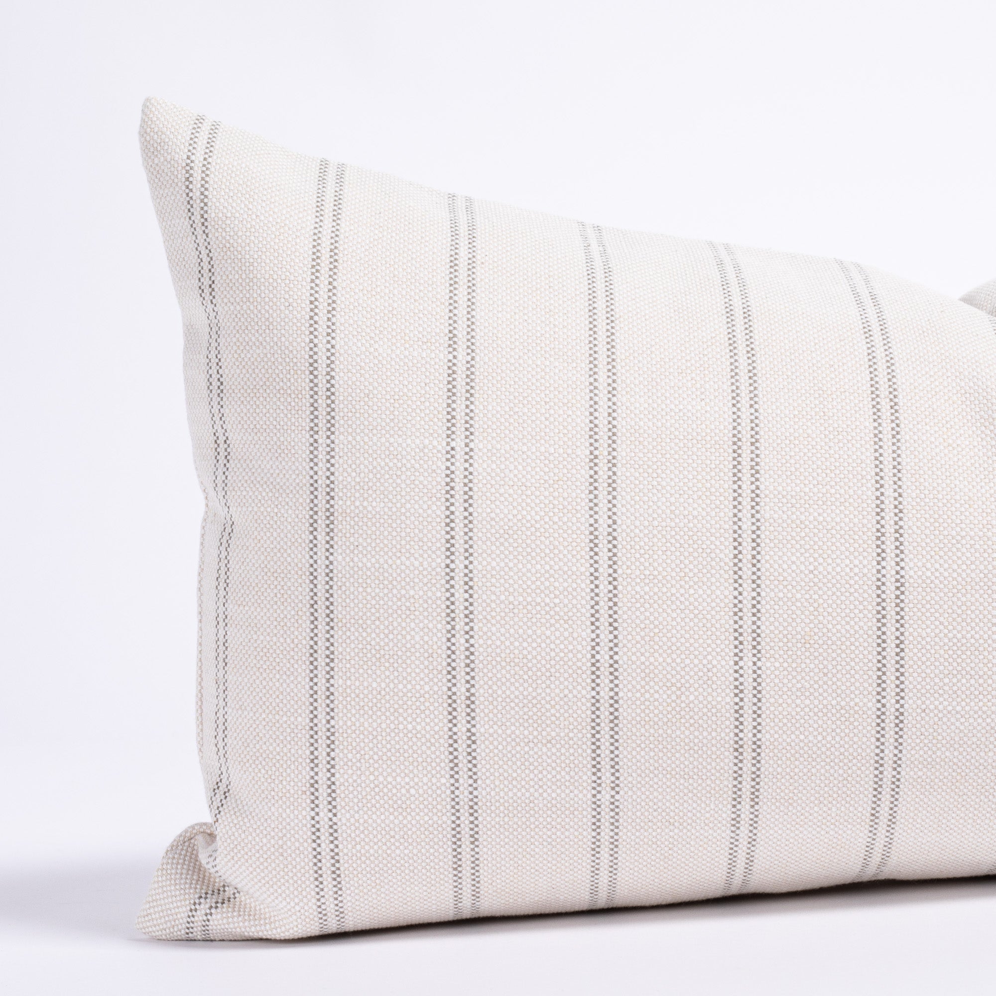 cream and gray vertical stripe lumbar pillow : close up view