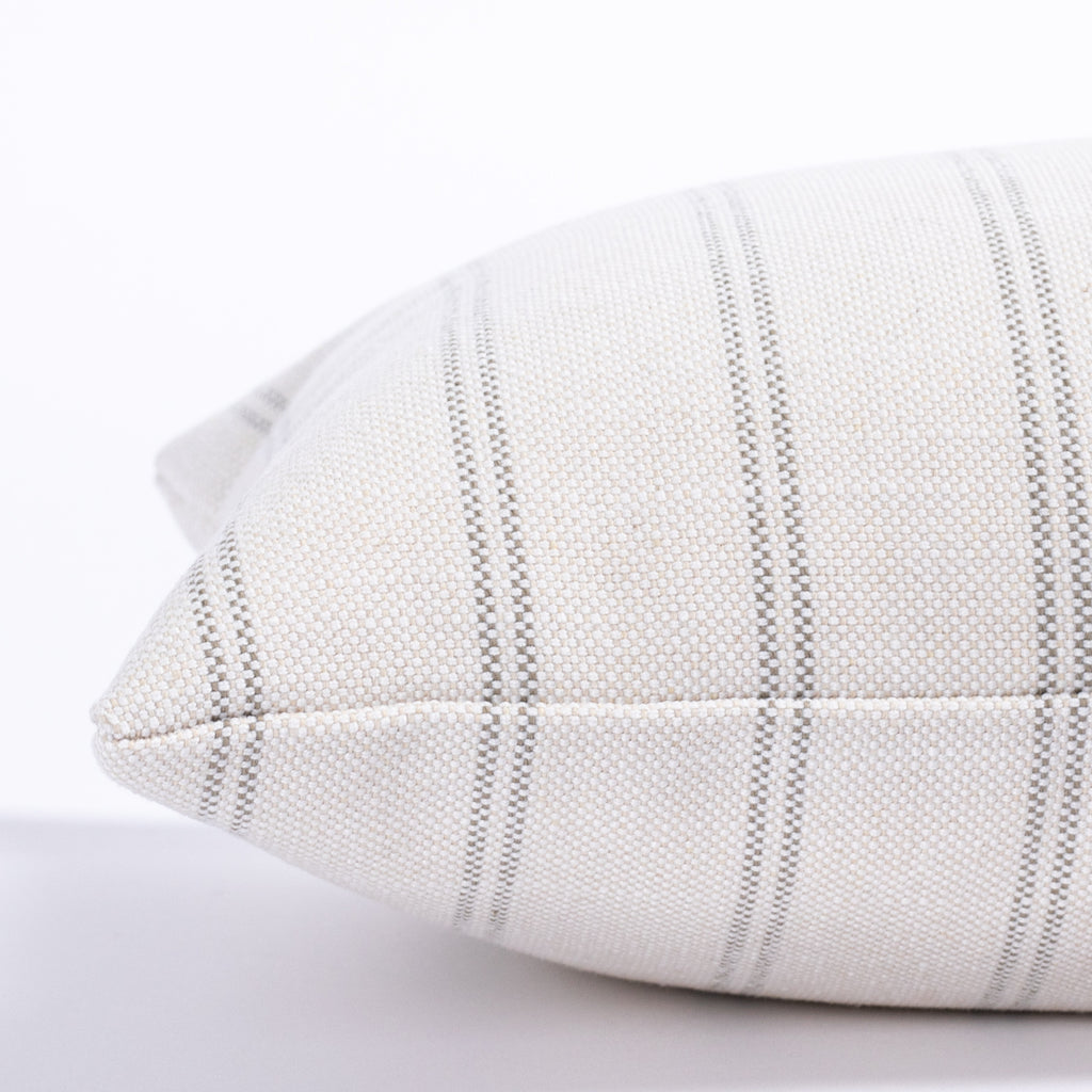 cream and gray vertical stripe lumbar pillow : side close up view 2 