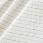 Fraser creamy-white and taupe stripe linen-blend drapery fabric from Tonic Linen