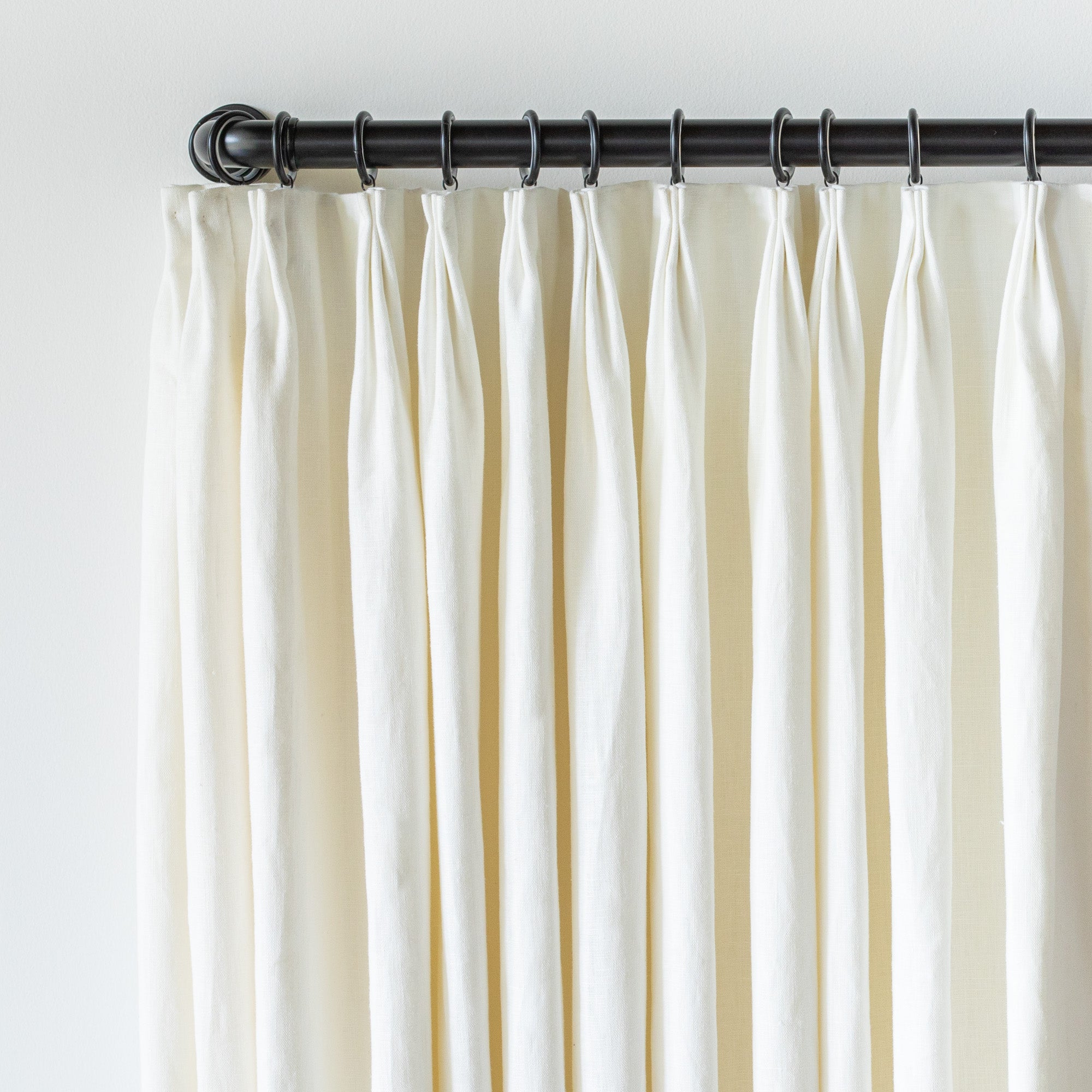 black metal french return bracket with drapes