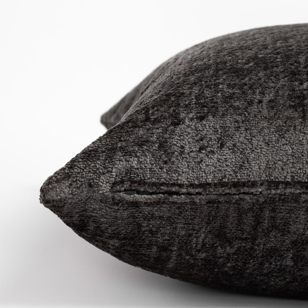 Ginsberg Velvet 22x22 Pillow Pewter, a charcoal gray velvet pillow : close up of zipper side