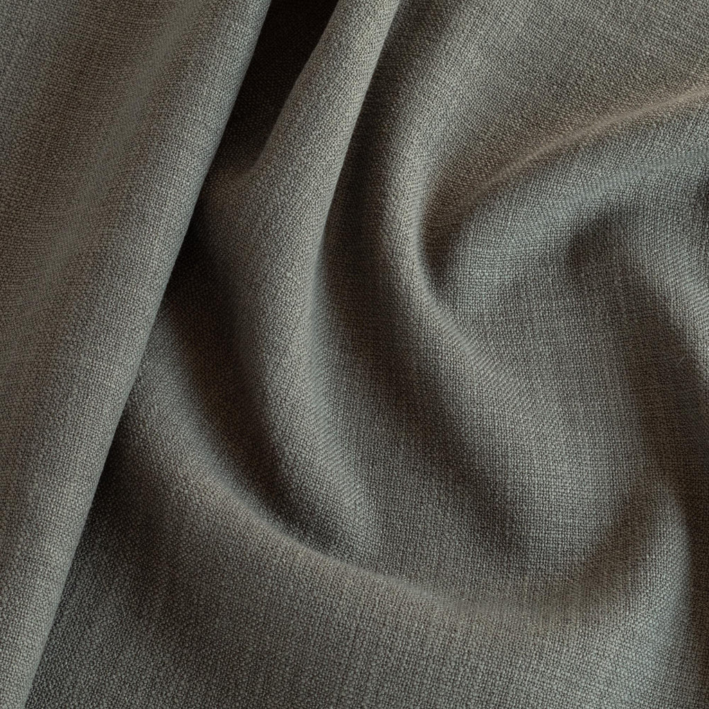 Grange Fabric Graphite, a deep charcoal gray upholstery fabric from Tonic Living