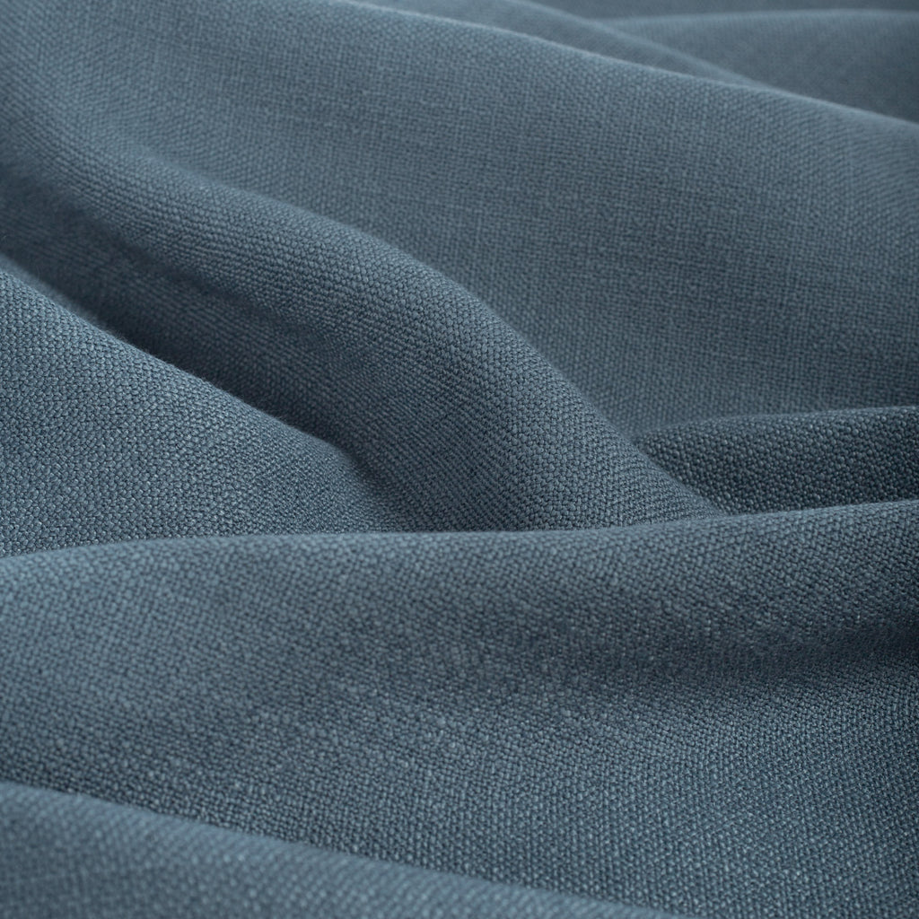 Grange Fabric Storm Blue, a high performance denim blue upholstery fabric with a subtle textural weave from Tonic Living