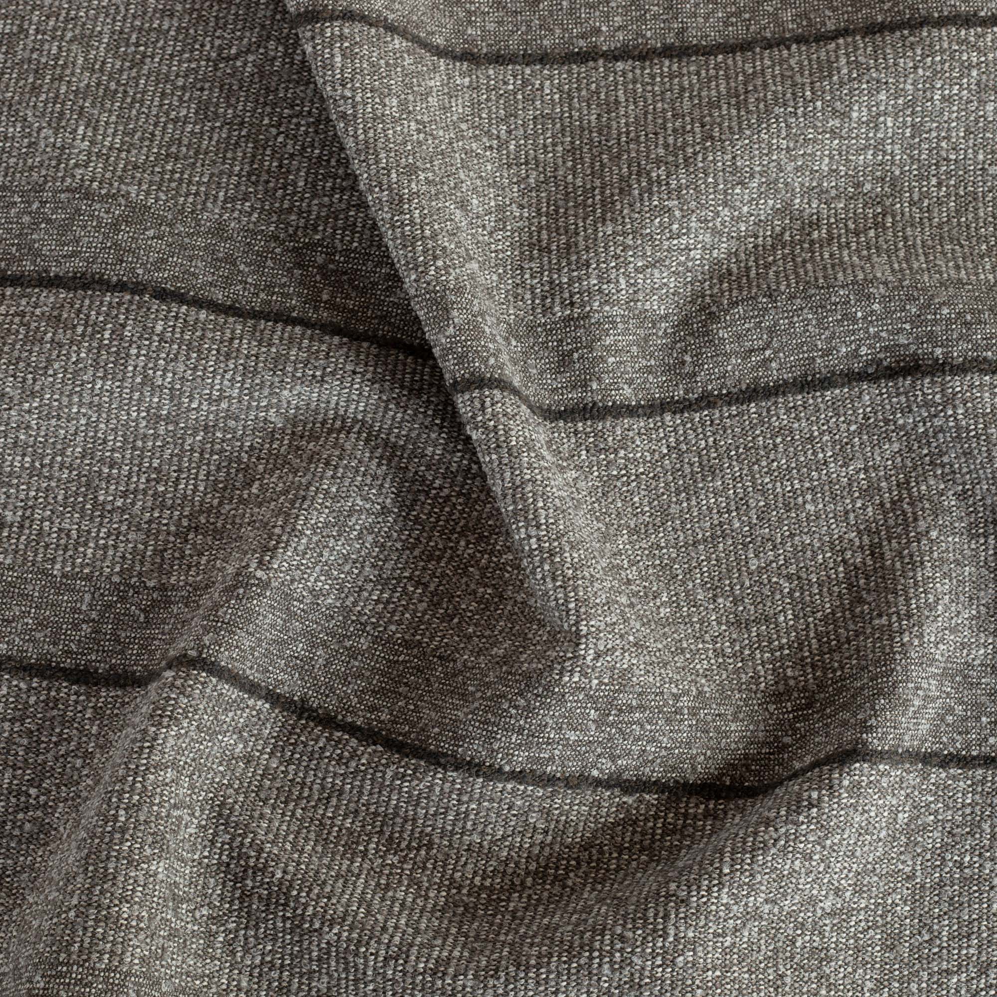 a textured tonal gray stripe upholstery fabric