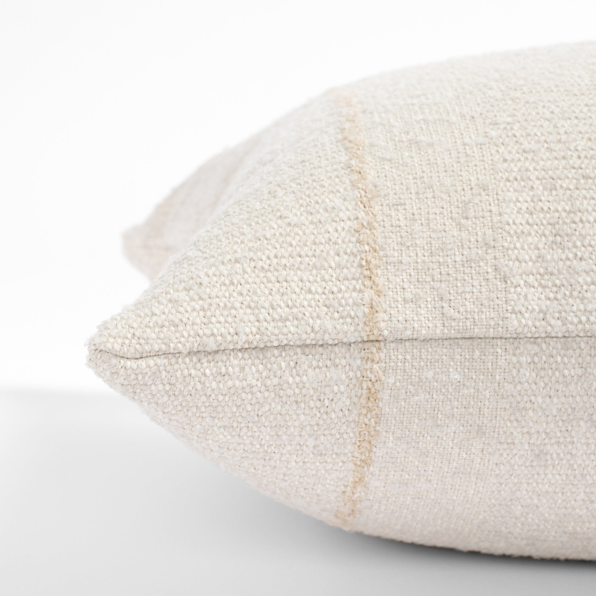 a tonal cream striped long lumbar throw pillow : side view
