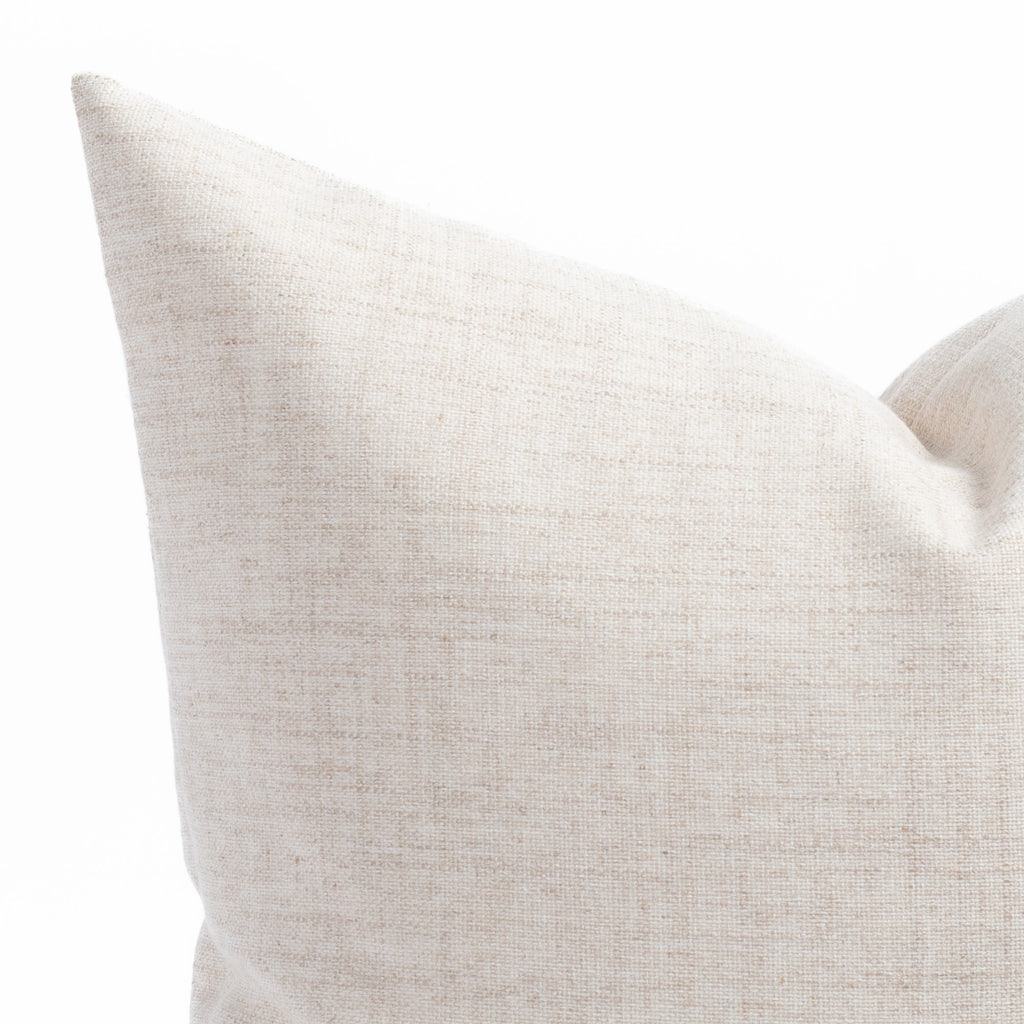 a oatmeal beige throw pillow : corner photo