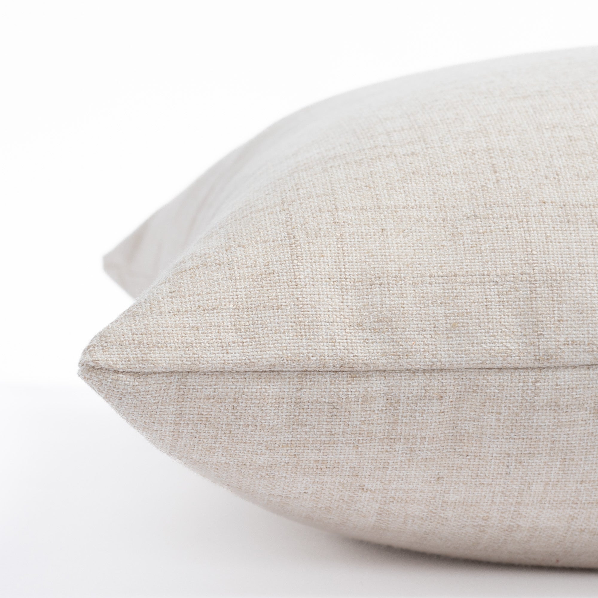 a oatmeal cream throw pillow : side photo