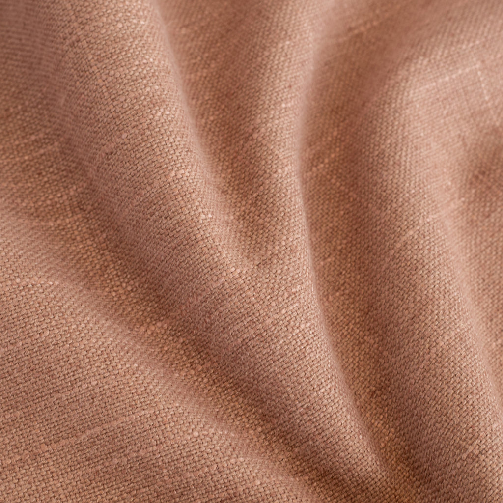 Hollis Terracotta, a warm pink orange high performance fabric from Tonic Living
