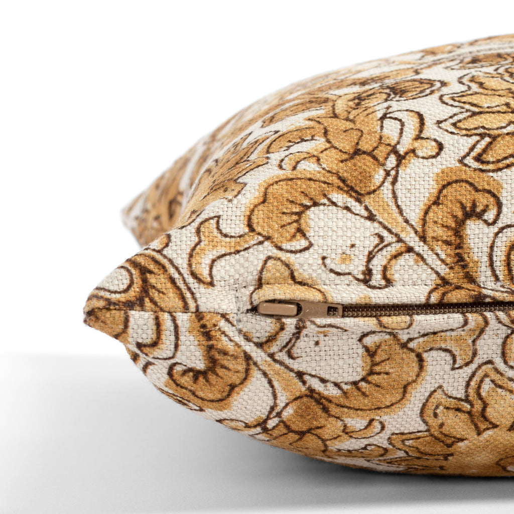 a gold, ochre and brown floral print throw pillow : Zipper detail