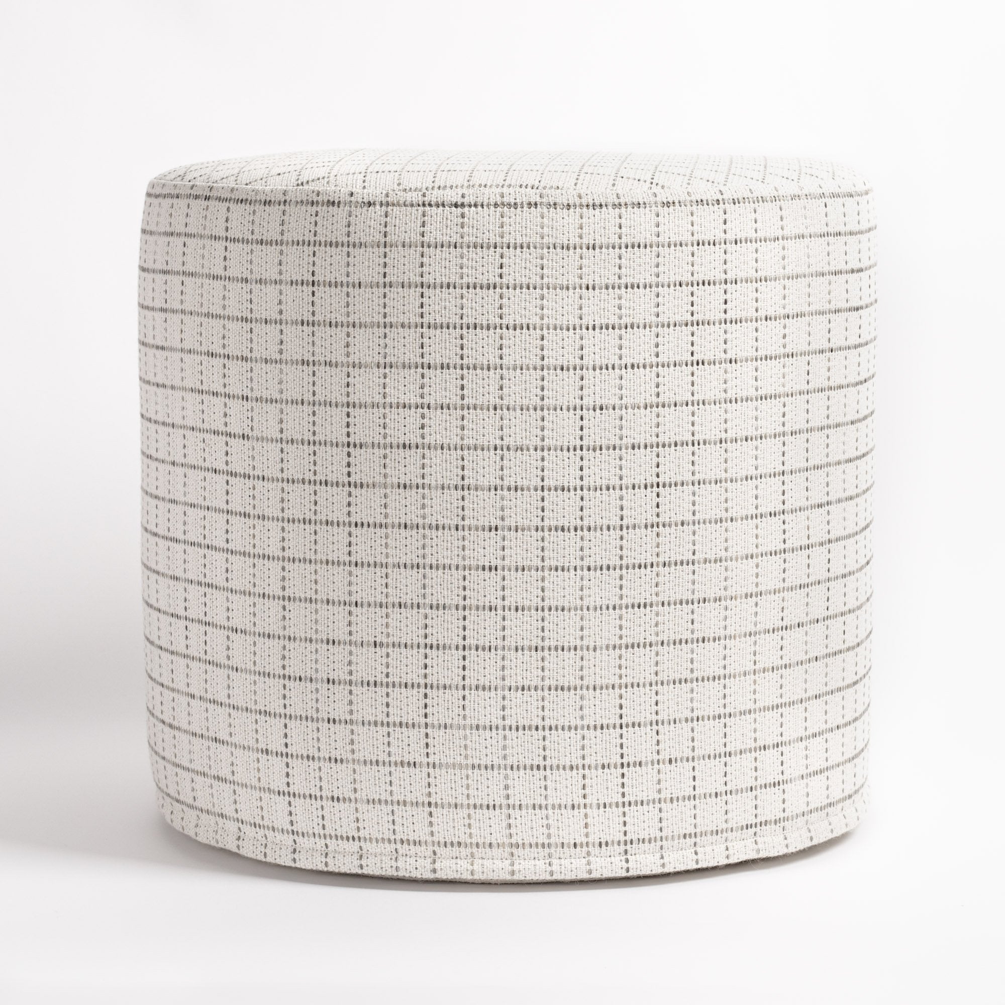 Keely Check Birch Ottoman, a cream and grey windowpane check round ottoman : side view