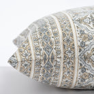 Lasha, a tan and light blue-gray block print throw pillow : side view