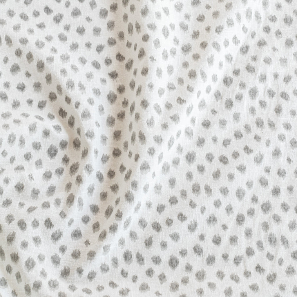 Mara Spot Soft Grey, a white and silver gray inky dot print fabric from Tonic Living