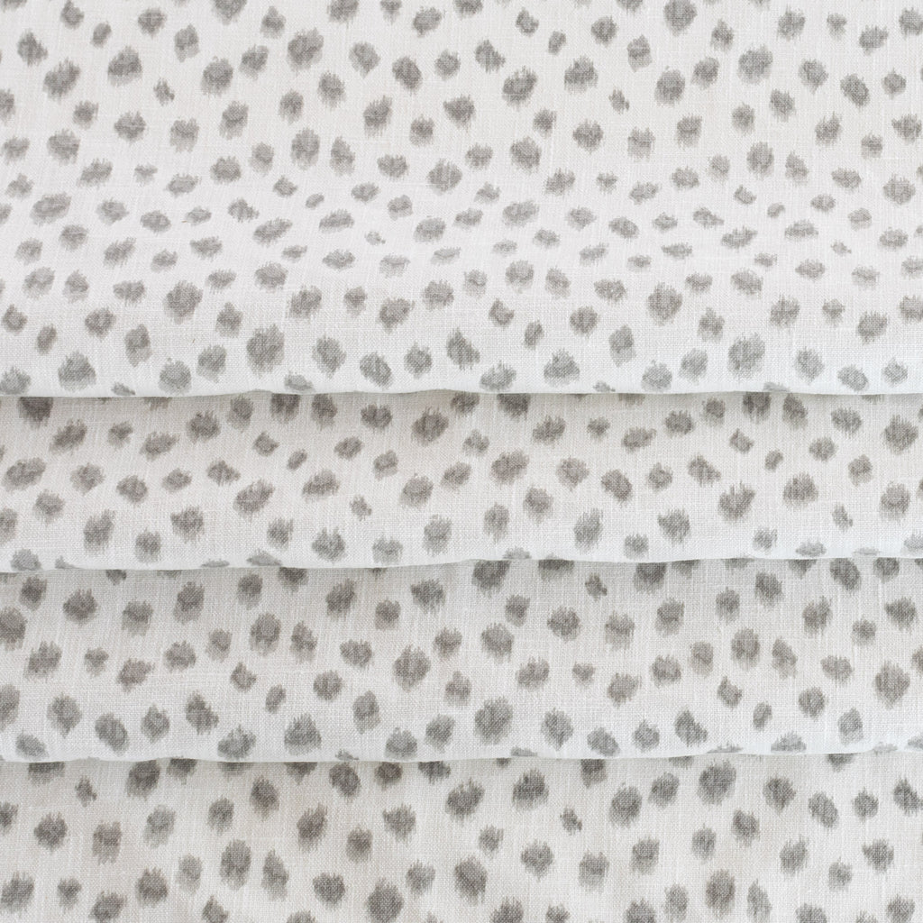 a white and silver grey inky dot print home decor fabric