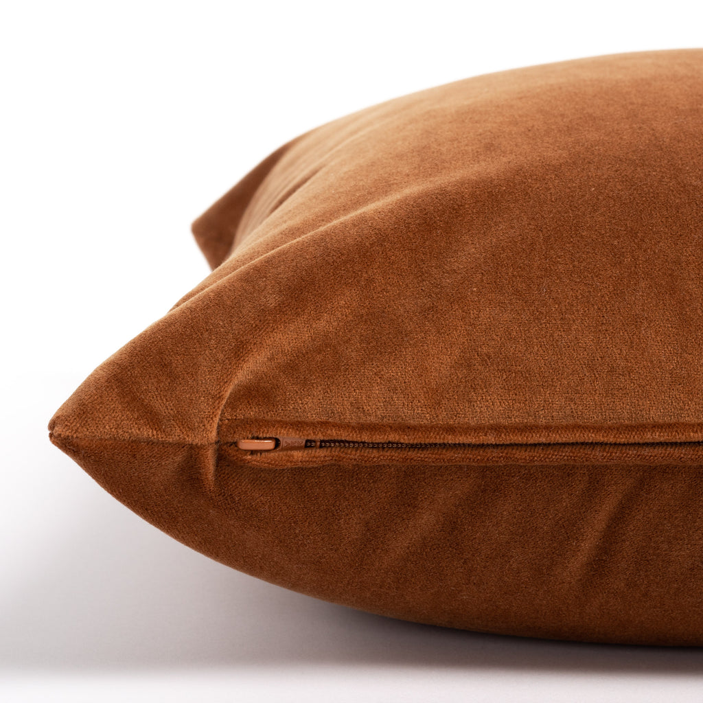 Mason Velvet Cognac, a rusty, burnt orange velvet pillow : close up zipper view
