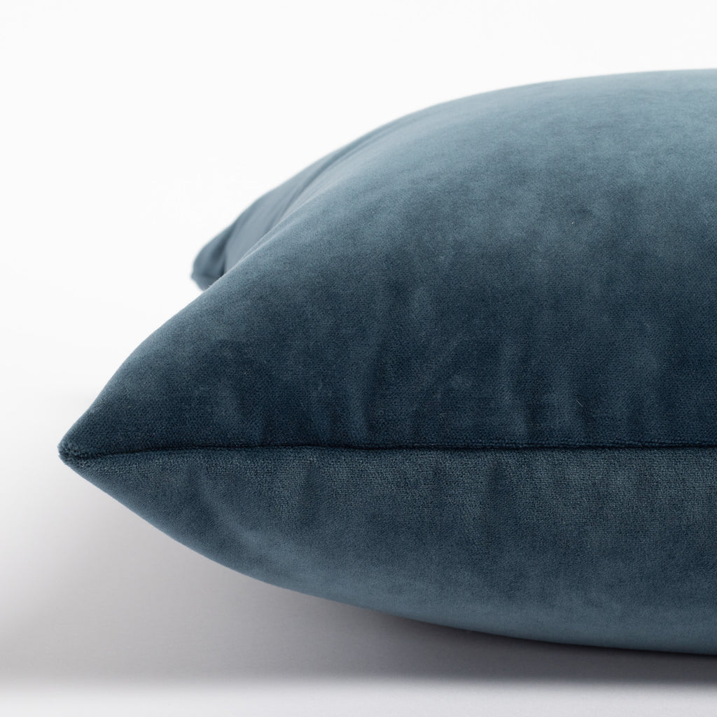 Mason Velvet Lakeland Blue, a rich blue with teal undertones velvet pillow : close up side view
