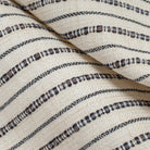 Misto Stripe Cream and Black, a cream and black striped Crypton home performance fabric : close up view