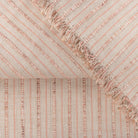 Misto Coral Blush, a light pink and light tan horizontal striped Crypton Home performance fabric : detail view