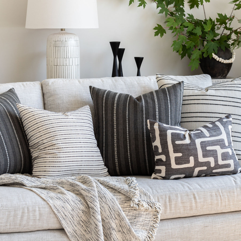 stanhope pearl sofa pillow combination : Misto cream and black stripe pillow with other black white & grey tone pillows