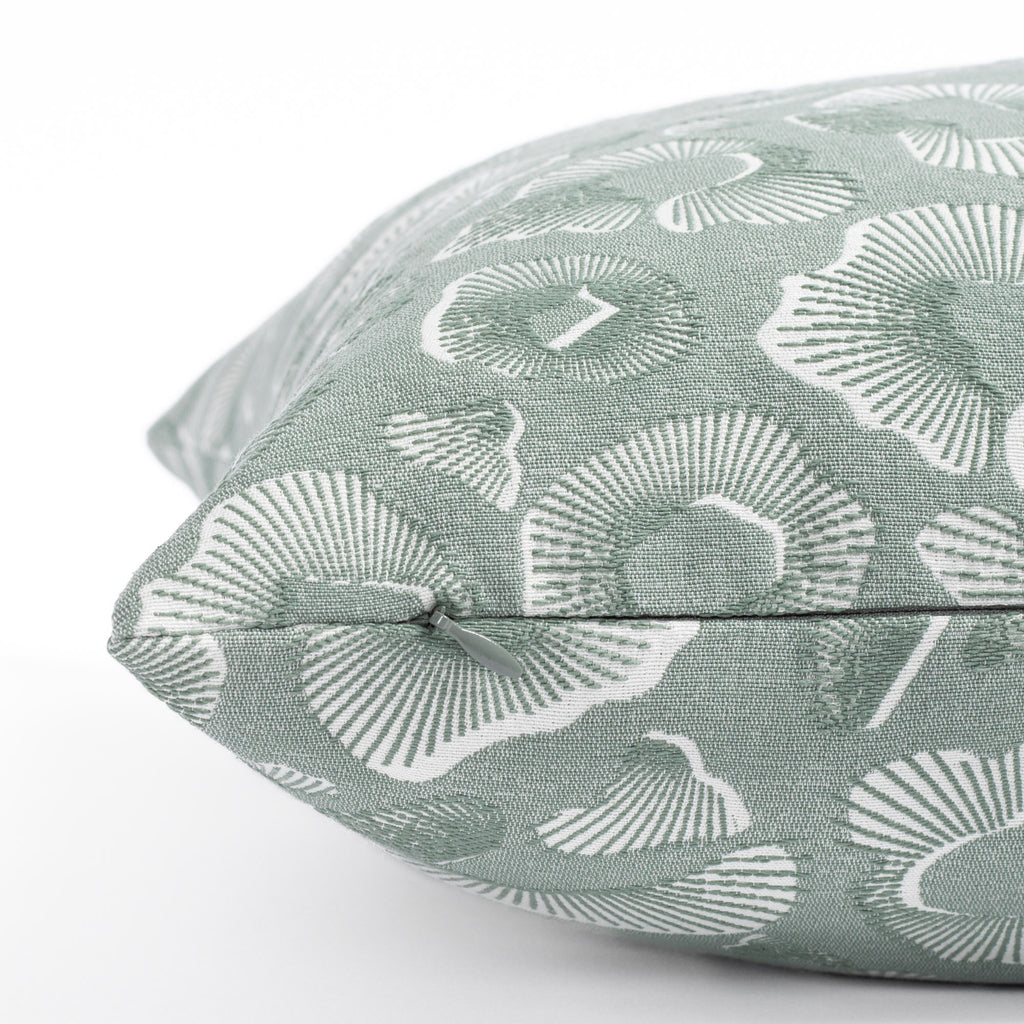 a jade green and white abstract ocean inspired patterned throw pillow : zipper detail