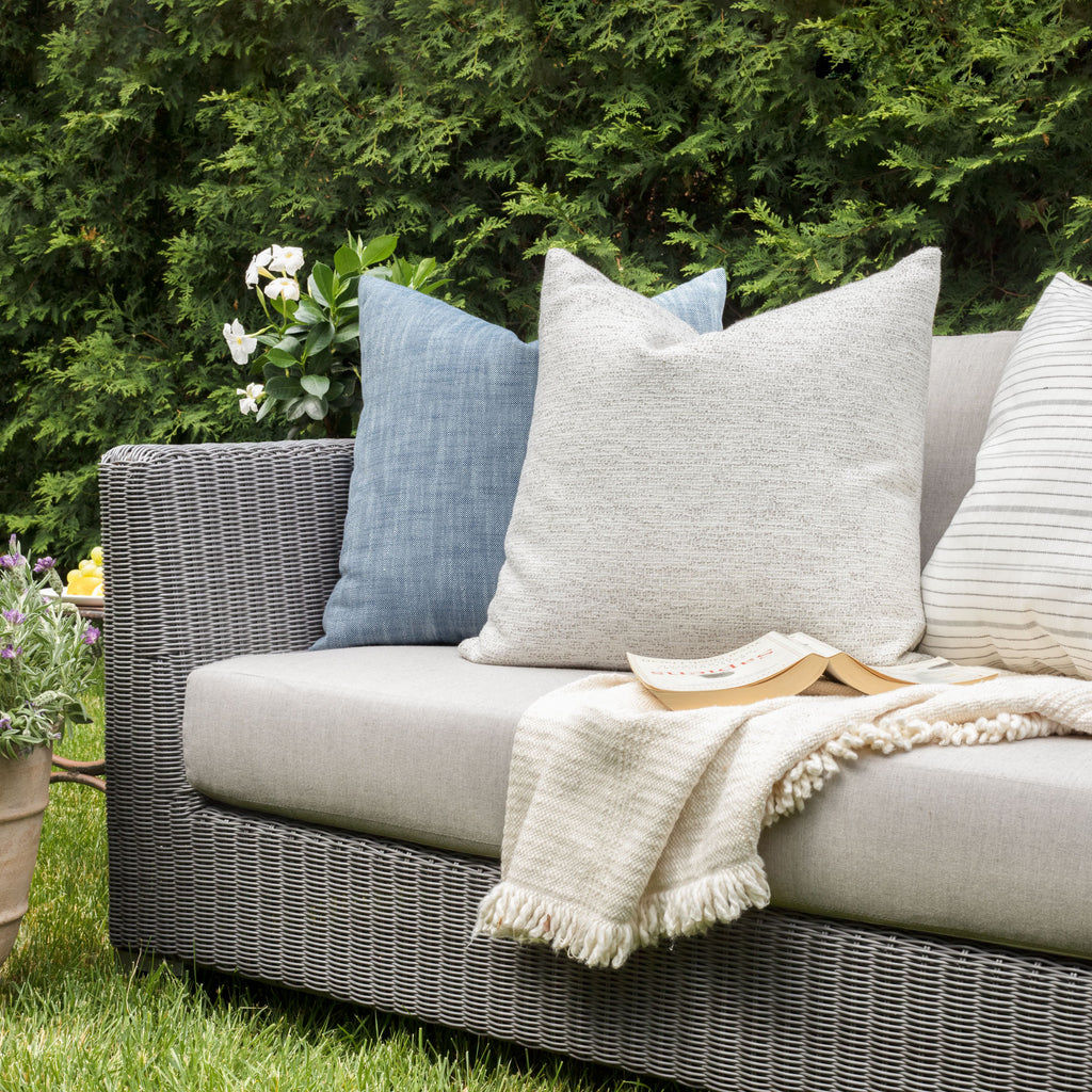 Outdoor Vignette : cream and light grey indoor outdoor pillow with blue pillows from Tonic Living