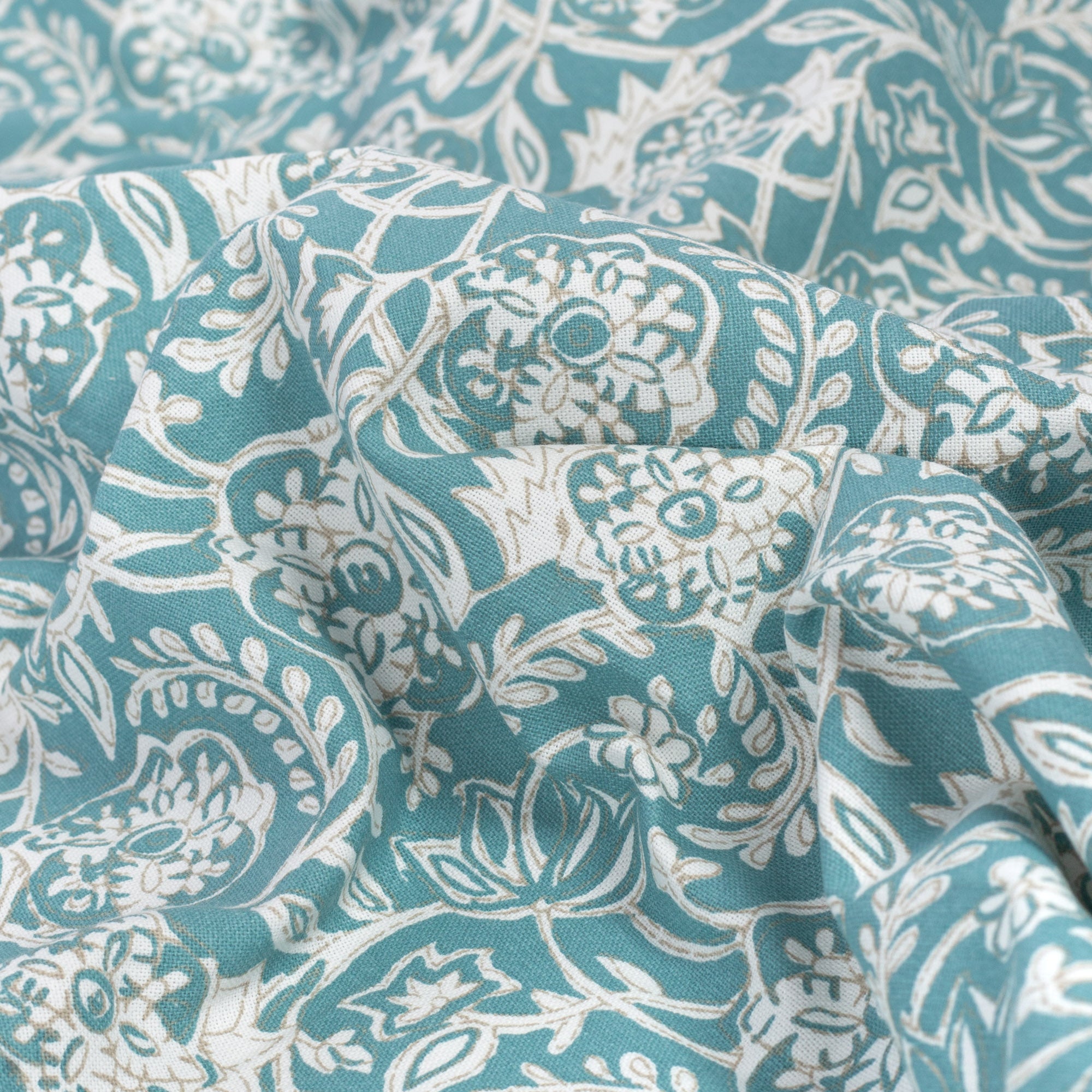 Padma Aqua, a tapestry block print pattern cotton fabric : close up view