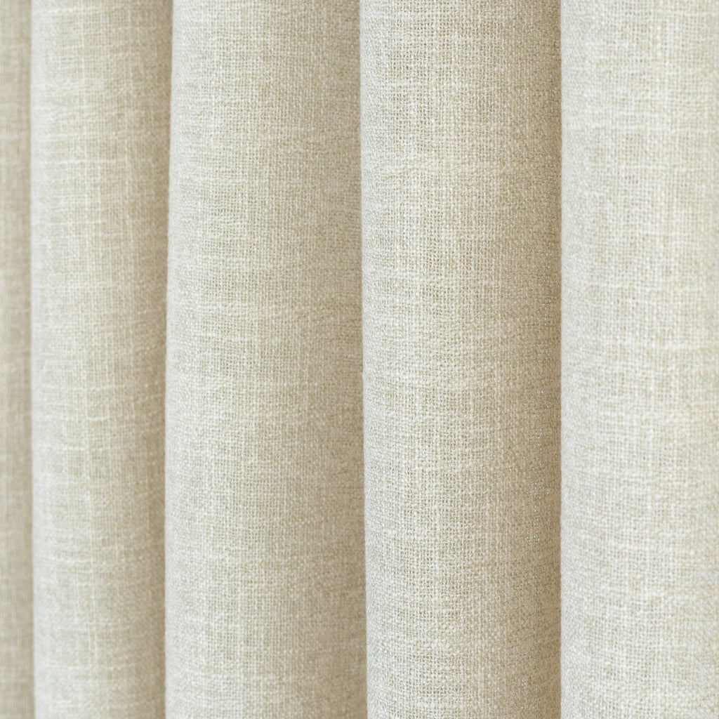 Peyton Sandstone, a sandy beige semi-sheer drapery fabric from Tonic Living